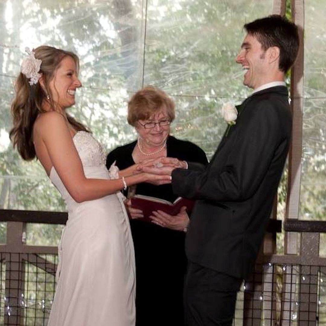 Couple laughing
                        during their wedding ceremony