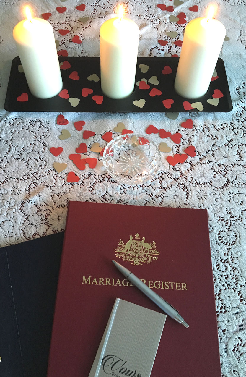 Marriage
                      Register on table with candles