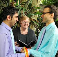 Andrew and
                      Fahad sharing a light-hearted moment during their
                      handfasting