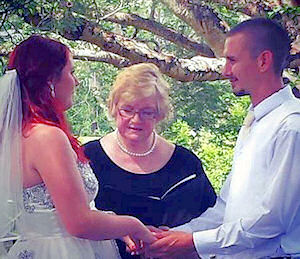 Jordan and Darryl making their
                      vows with Jennifer Cram Brisbane Marriage
                      Celebrant