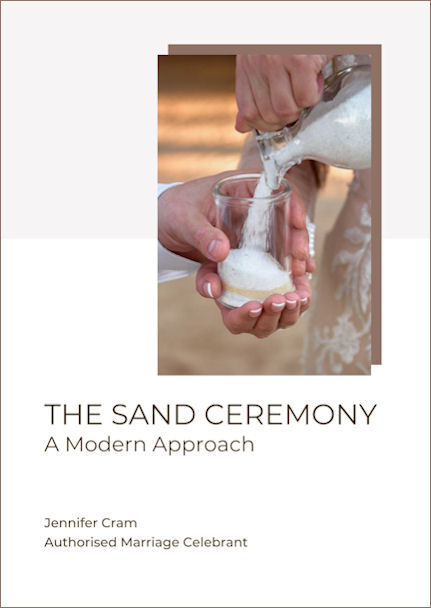 Cover of The Sand
                    Ceremony: A Modern Approach, by Jennifer Cram,
                    Authorised Marriage Celebrant. Photograph of a
                    couple, dressed in white, pouring white sand into a
                    container. Only their hands and lower arms are
                    visible.